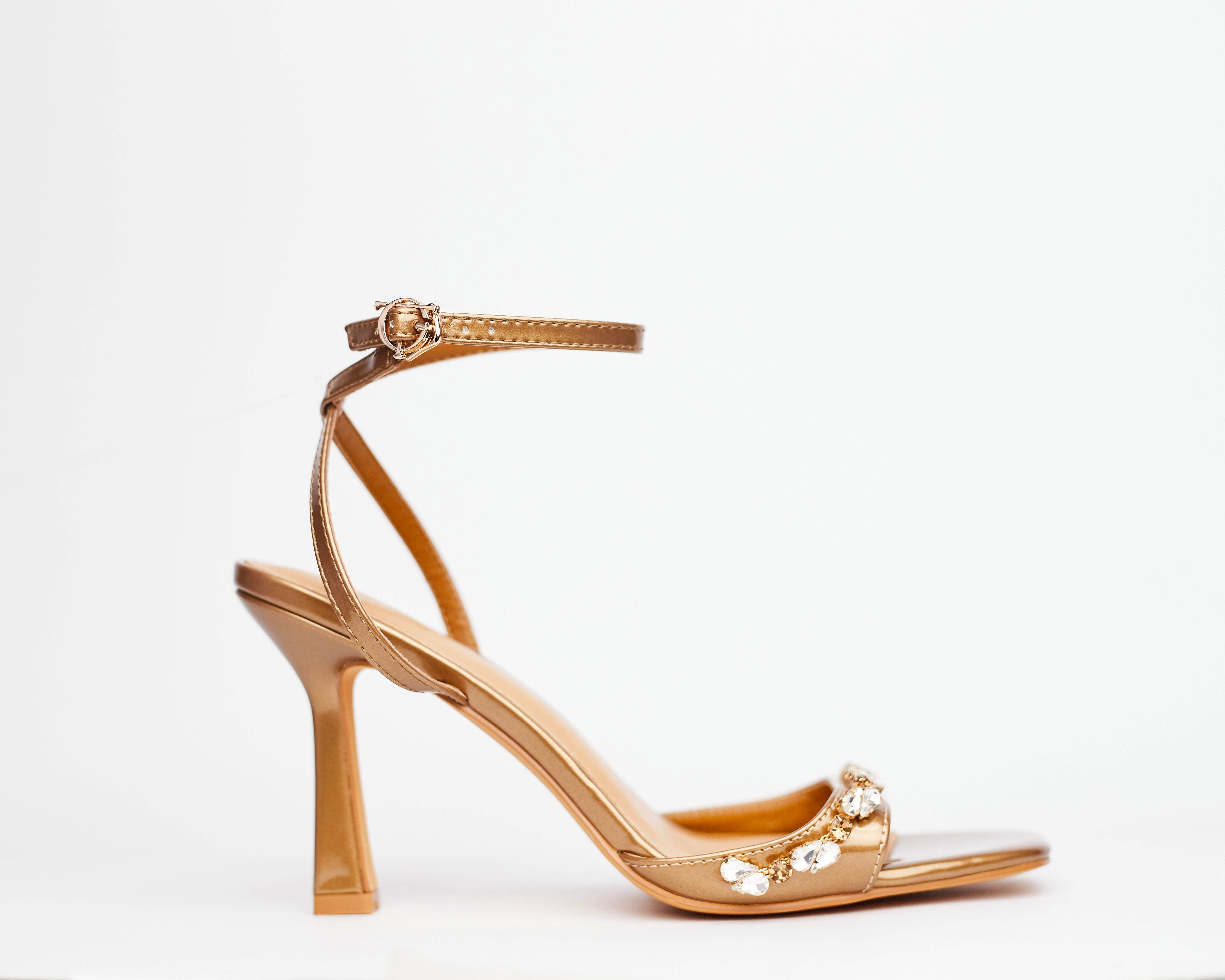 AMOKUA - gold classy sandal heels. Very stylish. has crystal accessories. Perfect for parties, classy girls night out and celebrations. Shipping worldwide from Ghana to UK, USA, AFRICA ETC.