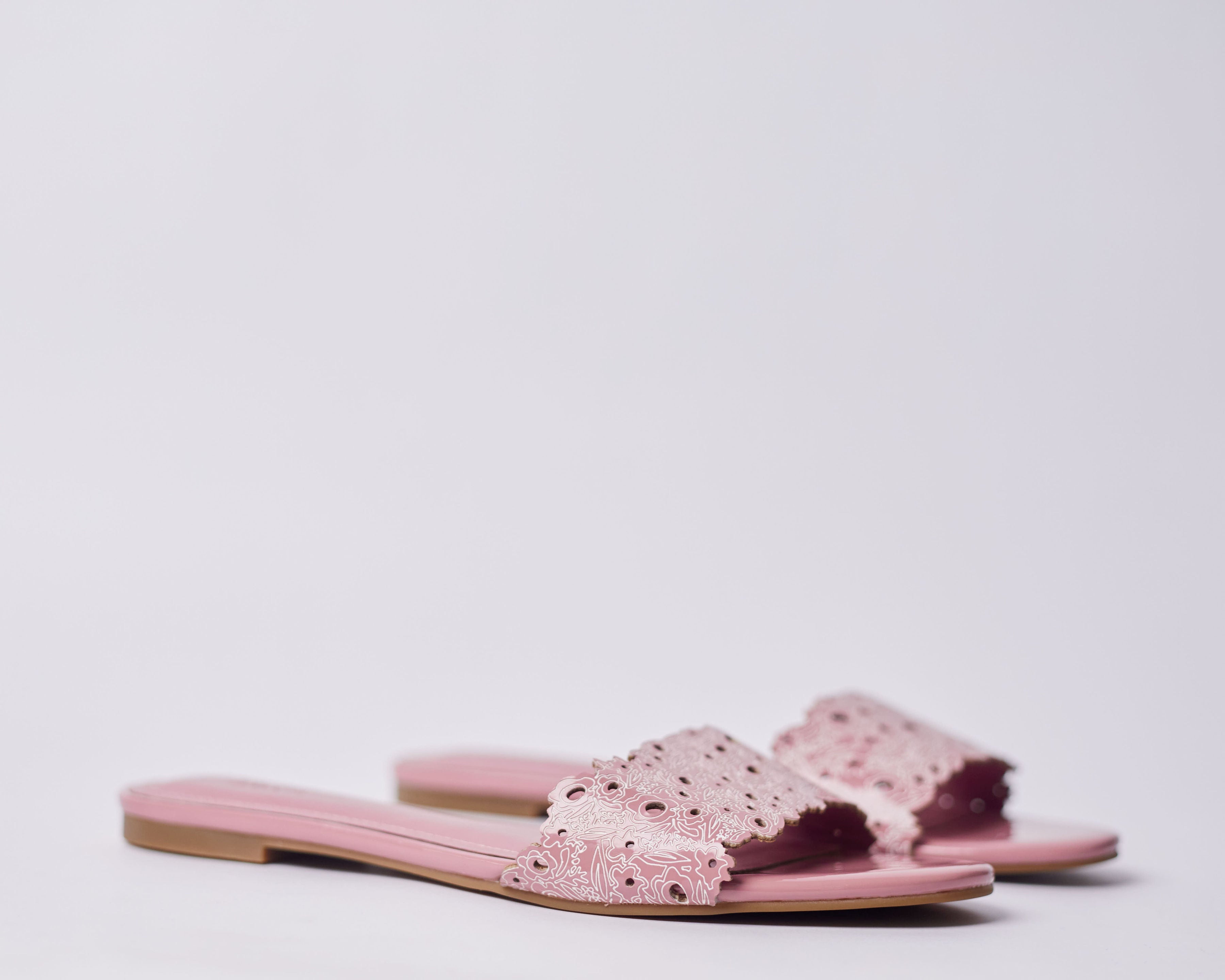 LAMISI - Floral inspired slippers for ladies. Very stylish,featuring a laser-cut upper. Can be worn for vacation, lunch and casual hangouts. Shipping worldwide from Ghana to UK, USA, Africa etc