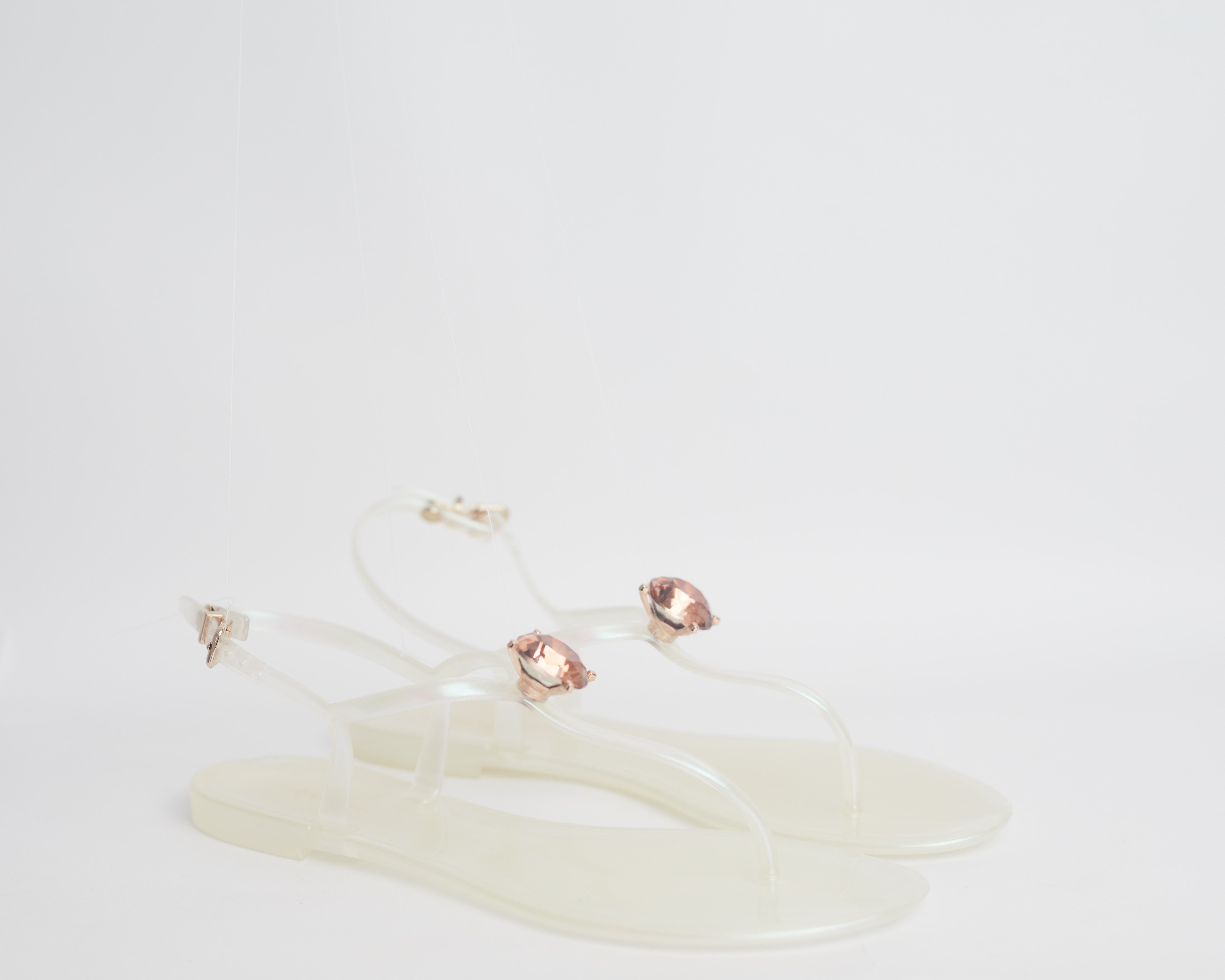 ZOLA - Pearl shimmer jelly sandals for ladies. Very stylish, has large crystal accessory. Ideal for brunch, day out with the girls, date night. Shipping worldwide from Ghana to UK, USA, Africa etc.